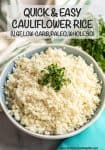 A large blue tinted serving bowl of homemade cauliflower rice with fresh herbs on top for garnish.
