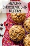 Close up of chocolate chip muffins on a red plate with a text overlay on the photo.