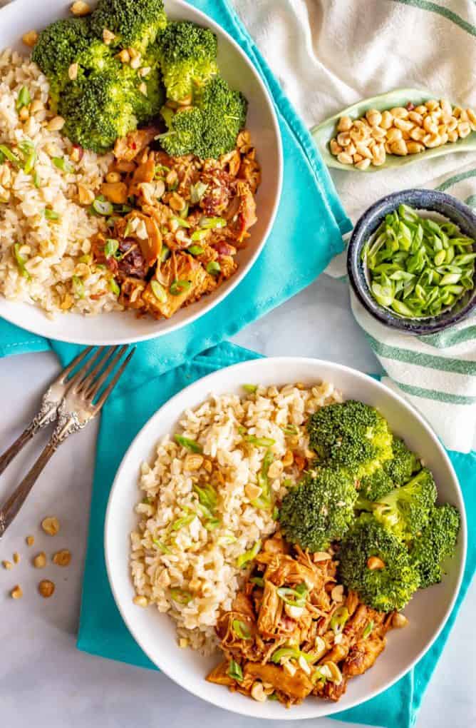 Honey garlic chicken rice bowls with brown rice and steamed broccoli are simple and full of flavor. Drizzle extra sauce over your entire plate and be ready to dig in! #chickendinner #ricebowl #grainbowl #healthychickenrecipes #mealprep