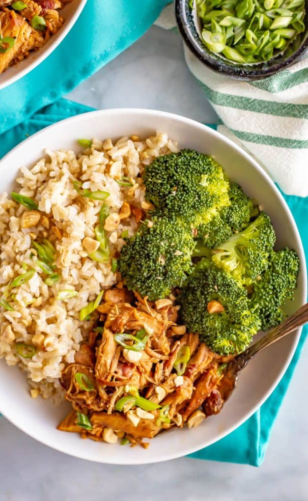 Honey garlic chicken rice bowls with brown rice and steamed broccoli are simple and full of flavor. Drizzle extra sauce over your entire plate and be ready to dig in! #chickendinner #ricebowl #grainbowl #healthychickenrecipes #mealprep