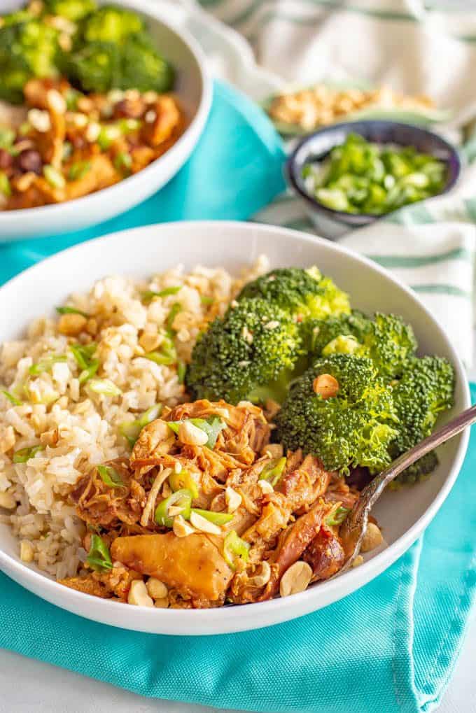 Honey garlic chicken served in a bowl with rice and broccoli