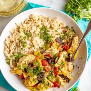 Slow cooker Mediterranean chicken is quick and easy to prep and bursting with bright, healthy flavors. This meal is loaded with tomatoes, artichokes and olives and goes great with rice or couscous. #slowcooker #chickendinner #easychickenrecipes #mediterraneanchicken