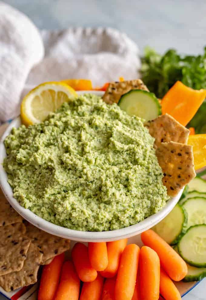 Spicy edamame dip is a super quick and easy appetizer with bright, fresh flavors and a hint of heat. It’s perfect for serving with crackers and veggies! #edamame #easyappetizer #healthyappetizers #stpatricksday
