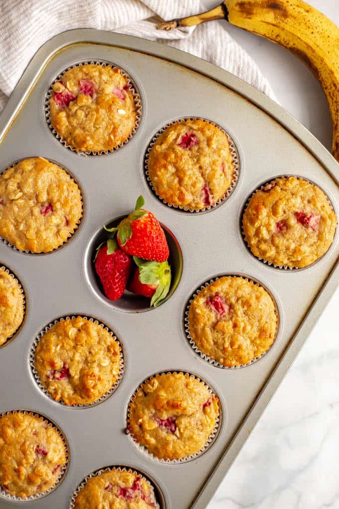 Easy strawberry banana muffins baked in a muffin tin