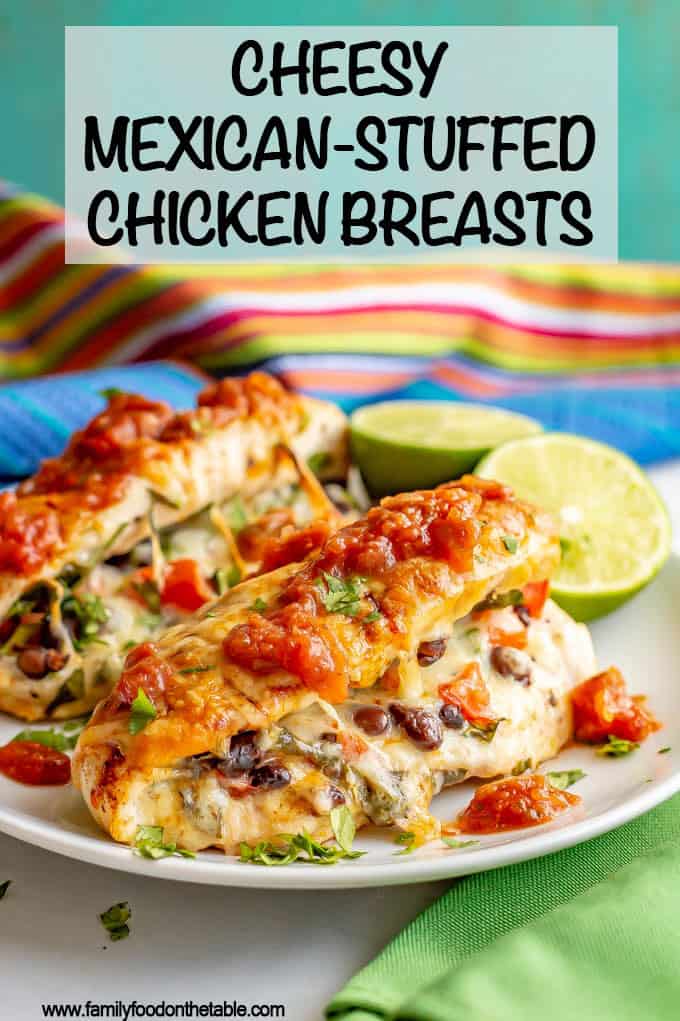 Cheesy Mexican stuffed chicken breasts are filled with black beans, tomato and cheese and topped with taco seasoning and more cheese for an easy, fun and delicious family dinner! #stuffedchicken #cheesychicken #chickendinner #dinnerideas