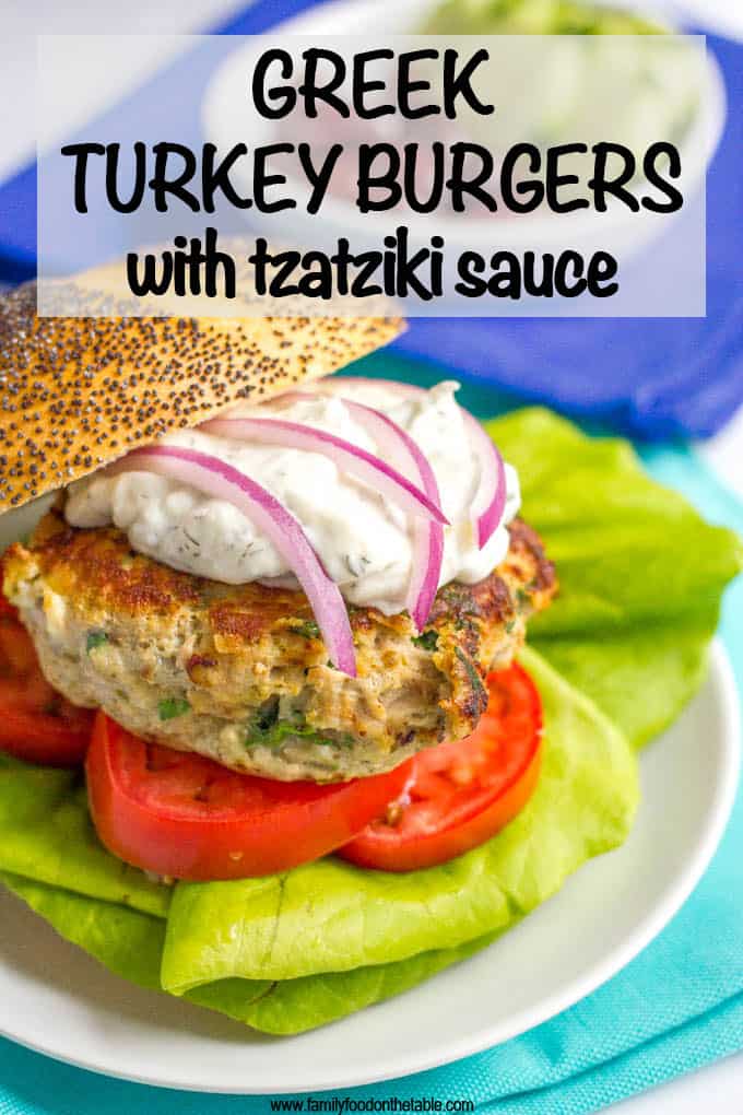 Greek turkey burgers with tzatziki sauce are loaded with spinach, red onion and feta cheese for a delicious but easy taste of Greece! #turkeyburger #burgers #summerrecipes