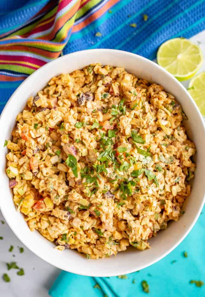 Southwestern coleslaw with black beans, corn, red pepper, jalapeno, taco seasoning and lime juice