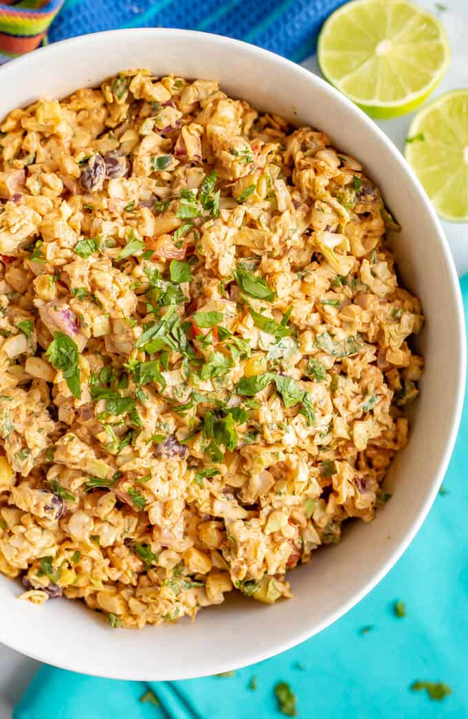 Large white bowl with creamy coleslaw and Mexican flavored dressing