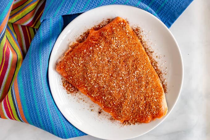 Large piece of salmon sprinkled with southwestern seasoning