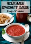 A bowl of homemade marinara sauce with an extra jar and plate of spaghetti noodles in the background