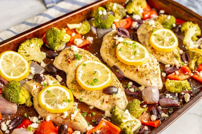 Baked Mediterranean chicken with vegetables on a sheet pan
