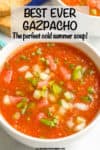 Bowl of gazpacho soup with chopped fresh veggies on top