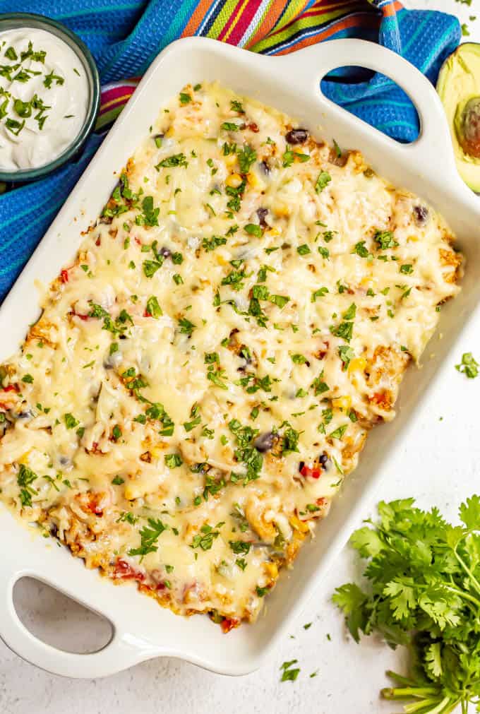 Mexican chicken quinoa casserole after baking in the oven with chopped cilantro on top