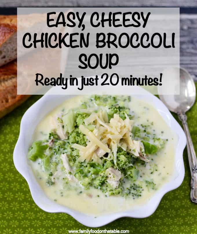 A bowl of hearty chicken broccoli soup with extra cheddar cheese on top