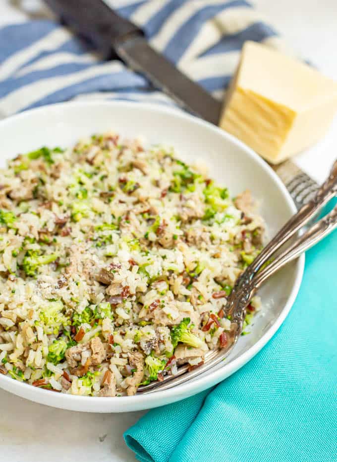 Serving of mixed rice with sausage and broccoli and Parmesan cheese