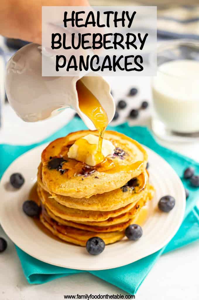 Healthy blueberry pancakes are light and fluffy and bursting with blueberries! These easy 1-bowl pancakes are the perfect way to start your day! #pancakes #blueberries #breakfast #healthyrecipes