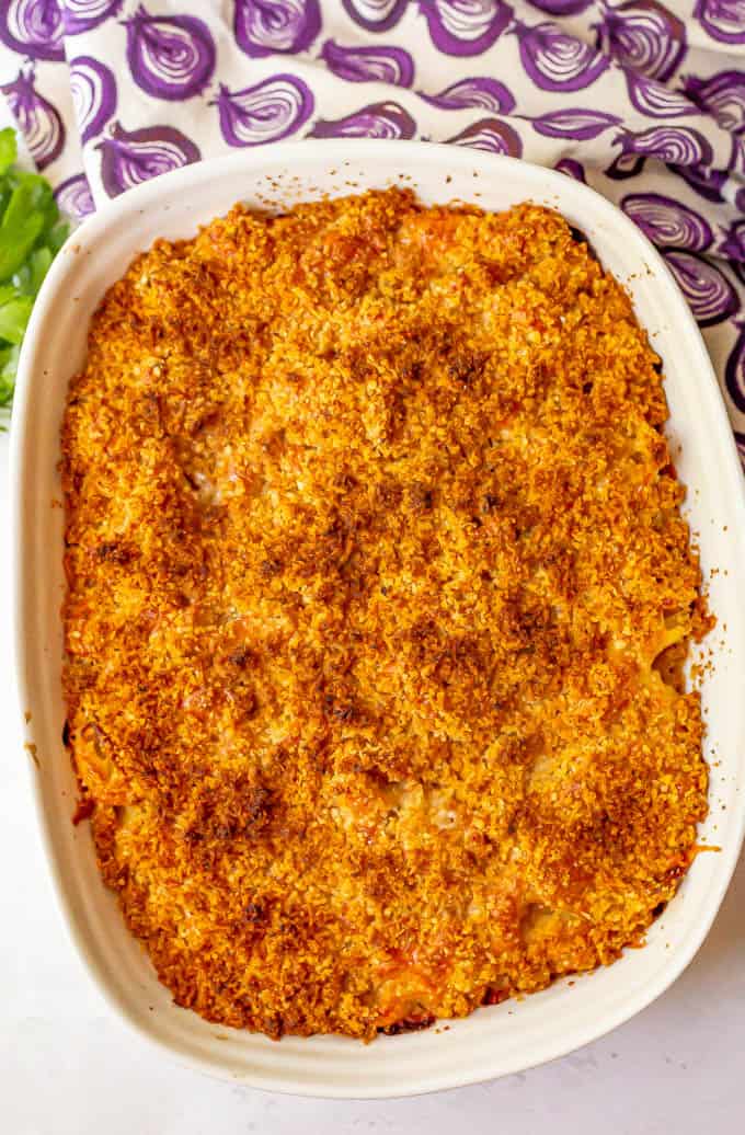 Crunchy baked macaroni and cheese in a casserole dish after finishing in the oven
