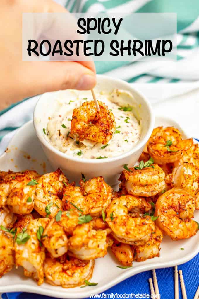 Spicy roasted shrimp are a quick and easy appetizer with just 3 ingredients that’s ready in about 15 minutes. These delicious, flavorful shrimp are always a hit! #shrimp #appetizer #partyfood #holidayparty #entertaining #seafood