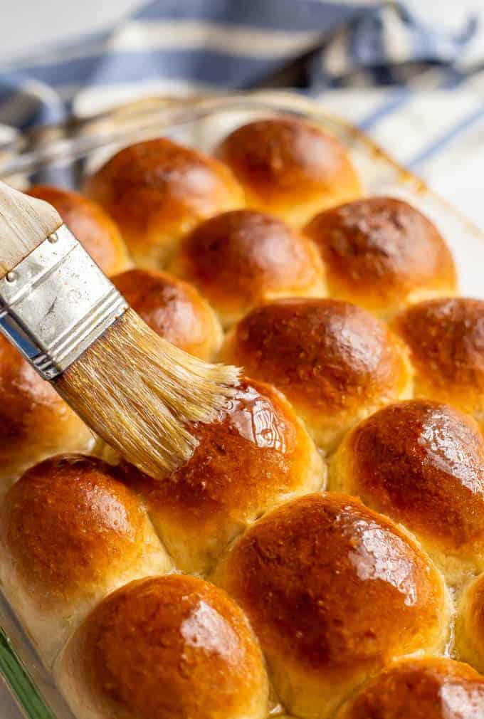 These easy homemade dinner rolls come out perfectly soft, ridiculously tall and gorgeously golden brown every time. And they are ready, start to finish, in just an hour! #dinnerrolls #breads #breadlove #bakinglove