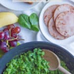 Green eggs and ham are a fun twist on breakfast and perfect for celebrating Dr. Seuss! These eggs are made without food coloring and can be prepared two different ways. #greeneggs #drseuss #breakfast #funfood #kidsfood