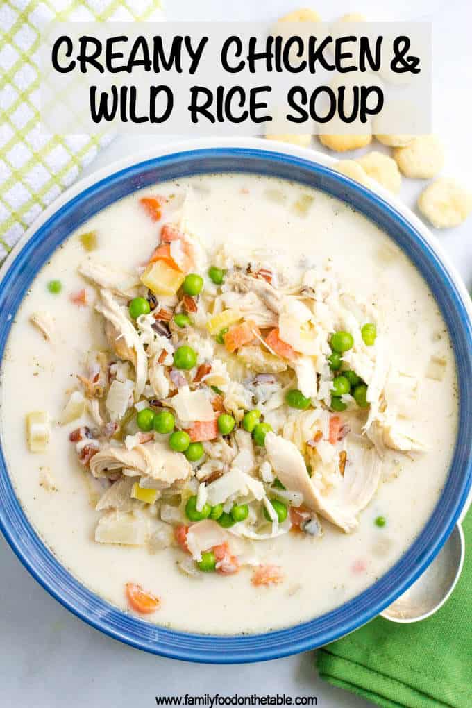 Healthy creamy chicken and wild rice soup is filled with veggies and deliciously creamy while still being very light. And it's ready in just 30 minutes! #soups #chickensoup #wildricesoup #healthysoups #wintersoups