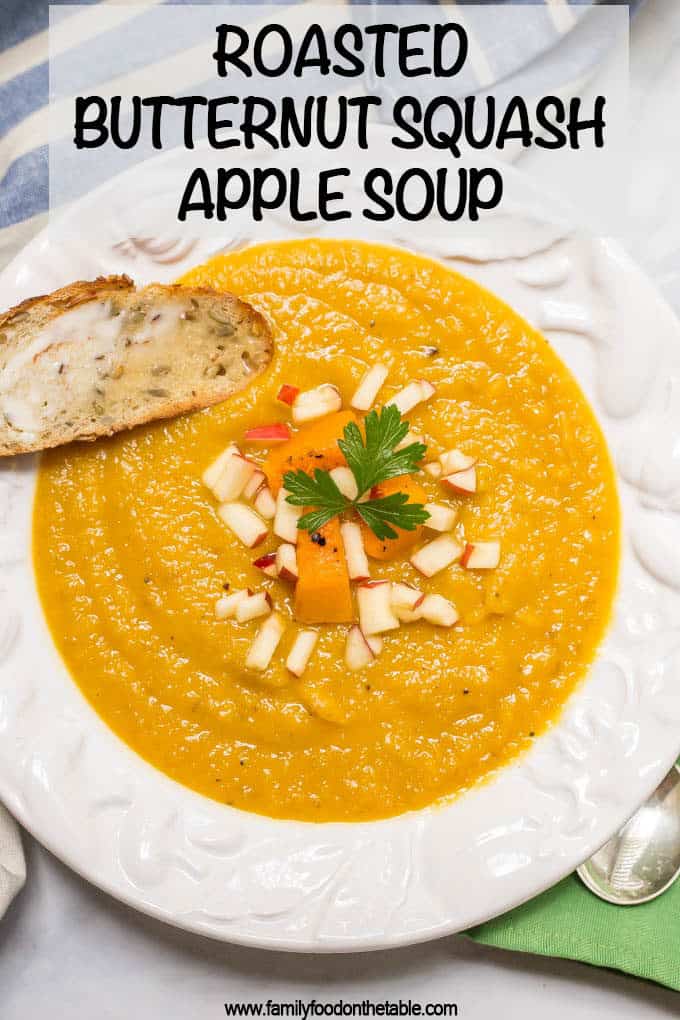 Roasted butternut squash apple soup is perfect for a cozy fall dinner! This soup is thick and filling and has a perfect background of sweetness and warm spices! #soup #souprecipe #butternutsquash #squashsoup #vegetarian