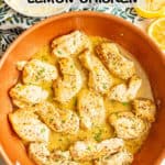 Strips of chicken breasts in a lemony sauce in a copper skillet