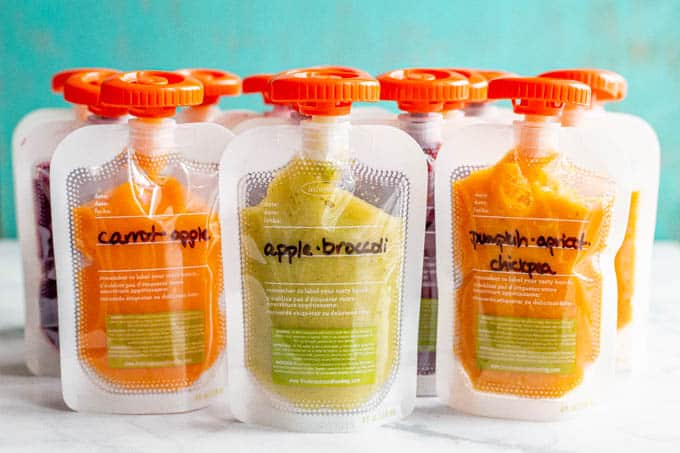 A collection of fruit and veggie baby squeeze pouches