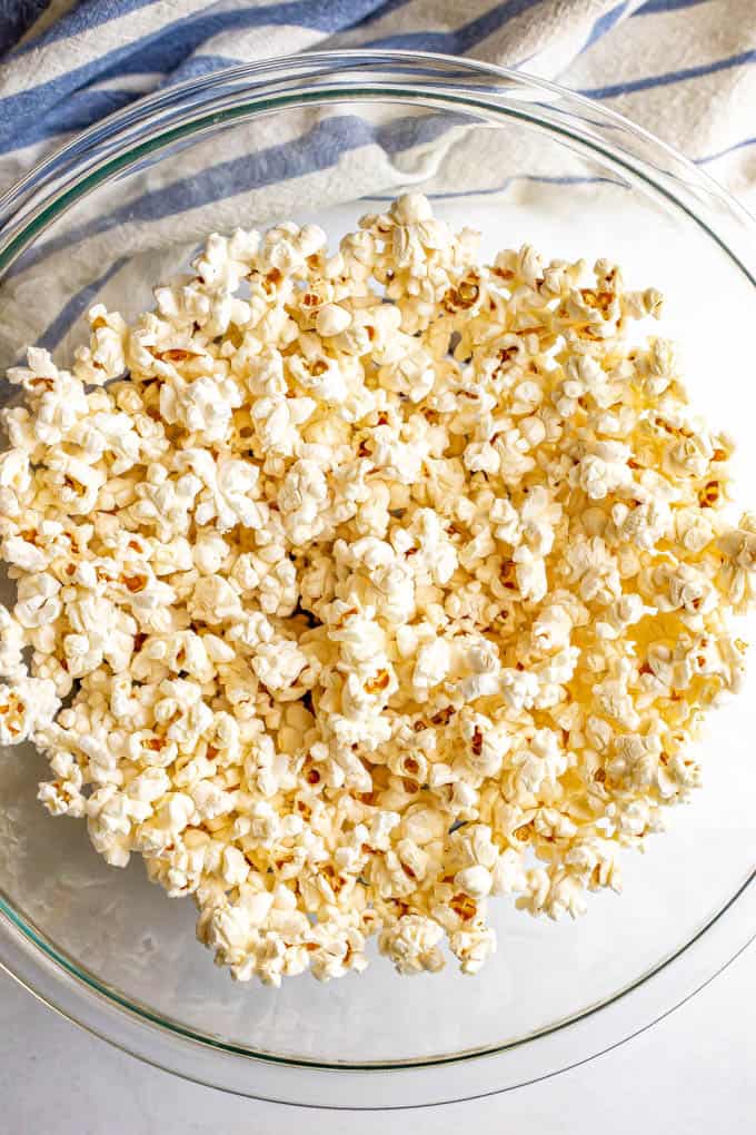Homemade popcorn in a large Pyrex bowl