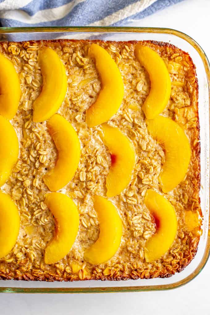 Peach baked oatmeal in a glass balking dish