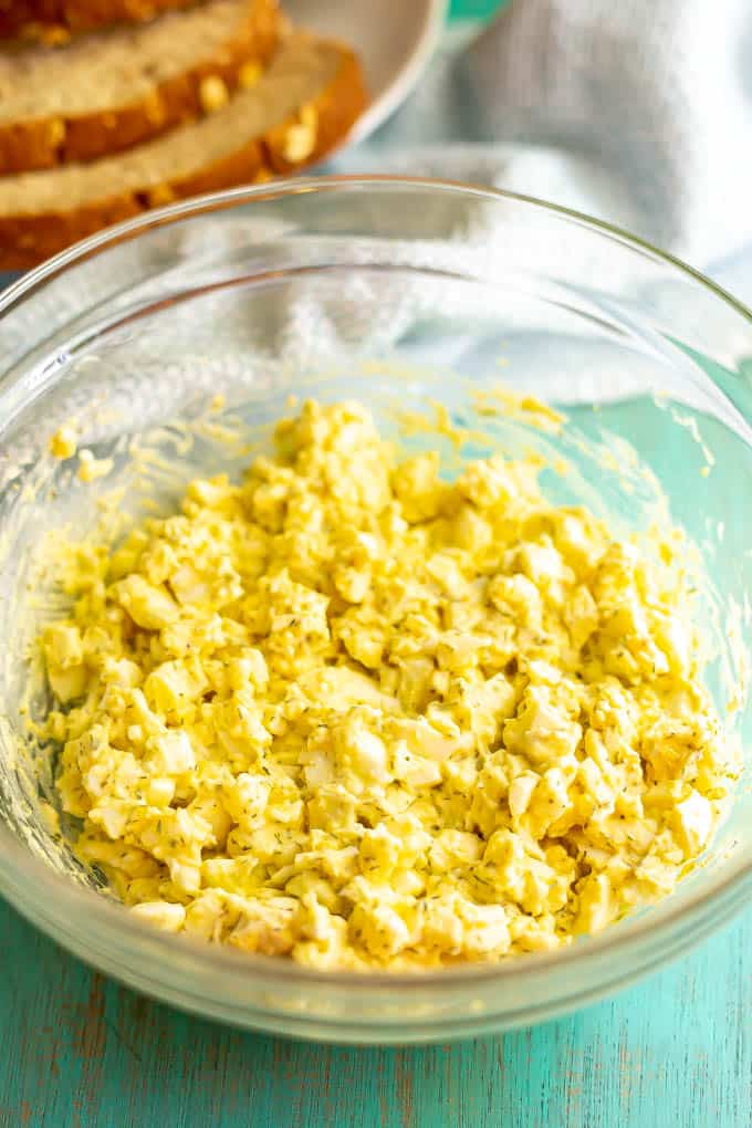 Egg salad mixed in a large glass bowl