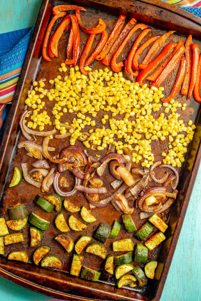 A baking sheet of roasted colorful veggies