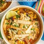 A bowl of chicken tortilla soup with black beans and corn, topped with tortilla strips, cheese and a lime wedge, with a text box overlap
