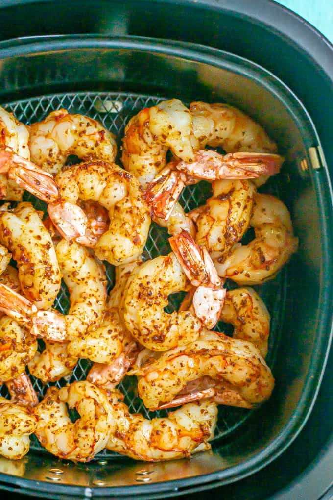 Cooked shrimp with the tails on after cooking in an Air Fryer