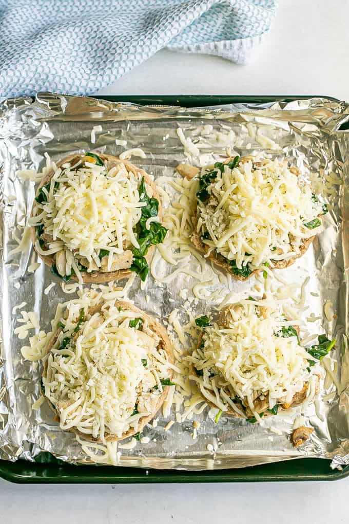 Turkey melts with spinach, mushrooms and mozzarella cheese before being broiled in the oven