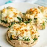 English muffin melts with turkey, spinach, mushrooms and mozzarella and a text overlap on the photo