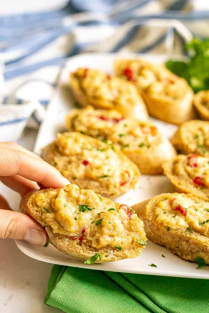 Cheesy crab melts on toasted bread slices