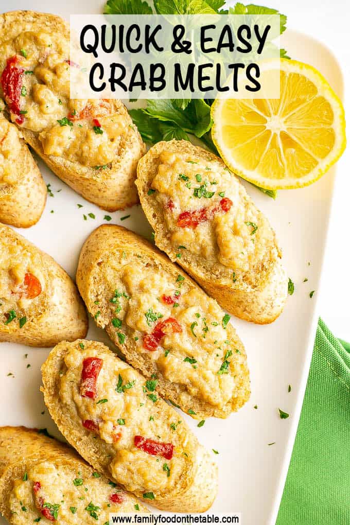 Baguette slices with a creamy crab mixture on top and a text overlay on the photo
