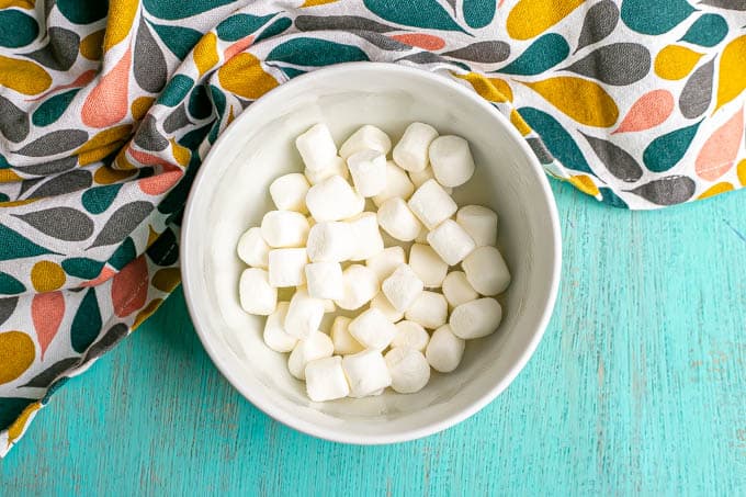 Mini marshmallows in a small white bowl