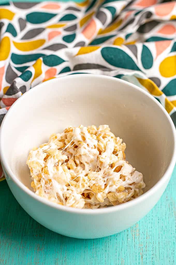 A marshmallow sticky microwave Rice Krispie treat in a bowl after being mixed together