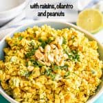 A bowl of curry flavored coleslaw with peanuts and cilantro on top, with a text overlay on the photo