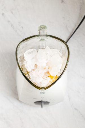 Overhead shot of a blender loaded with ice