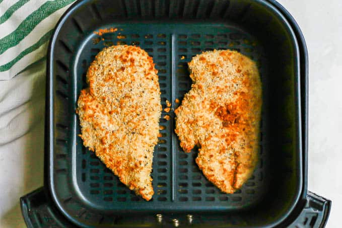 Breaded, browned chicken cutlets in an Air Fryer tray
