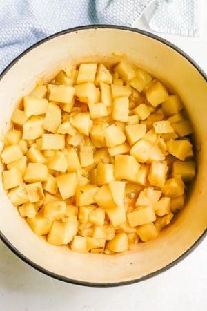 Tender chunks of potato in a large pot