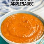 Crock pot applesauce in a large blue and white bowl with a text overlay on the photo