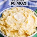 A bowl of creamy mashed potatoes with a pat of butter on top and a text overlay on the photo