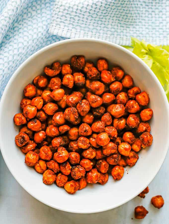 A small white bowl with seasoned and cooked Air Fryer chickpeas