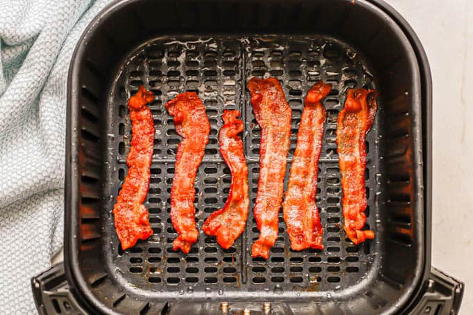 Cooked, crispy bacon in an Air Fryer tray