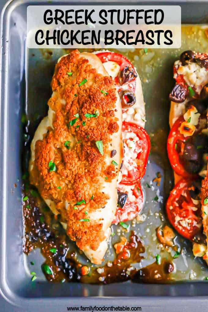 A baked stuffed chicken breast with tomatoes, olives and feta and a breadcrumb topping and a text overlay on the photo