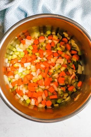 Sautéed onion, carrots and celery in an Instant pot